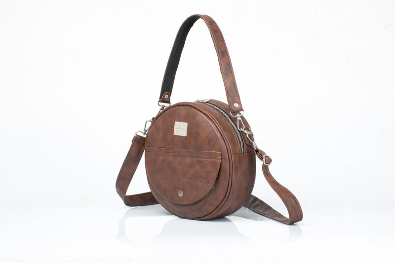 Elevate Your Look: Introducing the Elegant Round Sling Bag