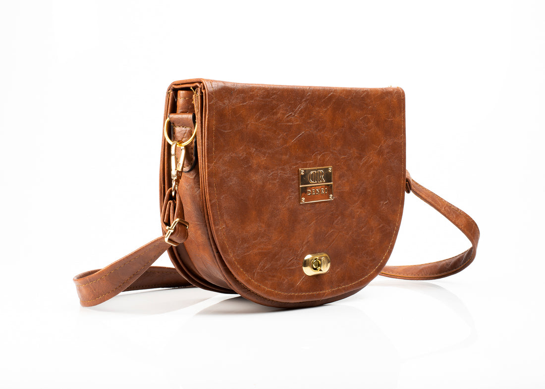 Effortless Elegance: Embracing Leisure with Our Relaxed Moon Sling Bag for Women