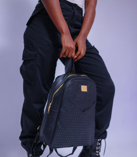 Denri Africa's black Monah Backpack. Black urban backpack, ergonomic shoulder straps, built for daily student or office use.