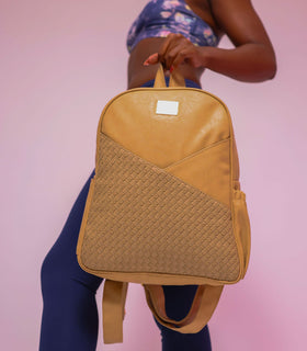 Denri Africa's beige Monah Backpack. Soft beige backpack, clean design, ideal for school or casual daily use.
