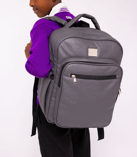 Denri Africa's gray Pioneer Backpack. Spacious anti-theft school backpack, sturdy fabric, everyday student bag.