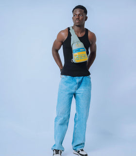 Denri Africa’s blue Denri x Manyatta Crossbody Bag. Compact chest bag, vibrant blue vegan leather, practical everyday carry.