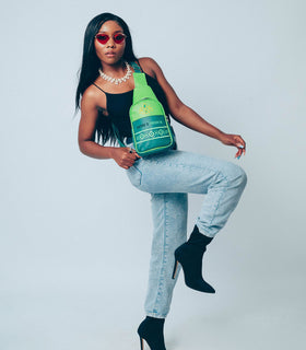 Denri Africa’s green Denri x Manyatta Crossbody Bag. Lightweight vegan-leather chest bag, rich green tone, perfect for urban travel and errands.