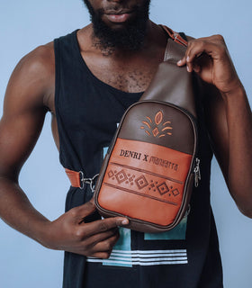 Denri Africa’s brown Denri x Manyatta Crossbody Bag. Urban crossbody sling bag, minimalist vegan leather, perfect for travel and daily essentials.