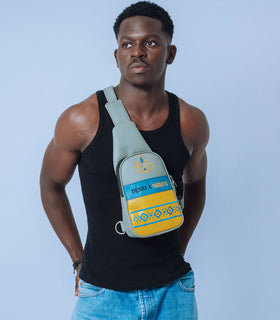 Denri Africa’s blue Denri x Manyatta Crossbody Bag. Sleek crossbody bag, lightweight vegan-leather sling, modern urban style.