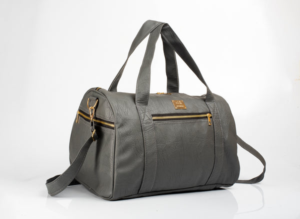 Denri Fabela Travel Bag | Leather Duffel Bag | Grab handles, Multiple pockets