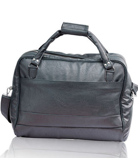 Denri Africa's black Voyage Travel Bag. Spacious vegan-leather duffle bag, extra-large travel luggage, ideal for long trips.