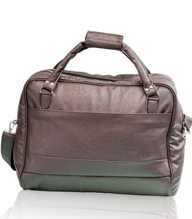 Denri Africa's brown Voyage Travel Bag. Classic travel duffle, premium vegan leather overnight bag, perfect for business or leisure travel.